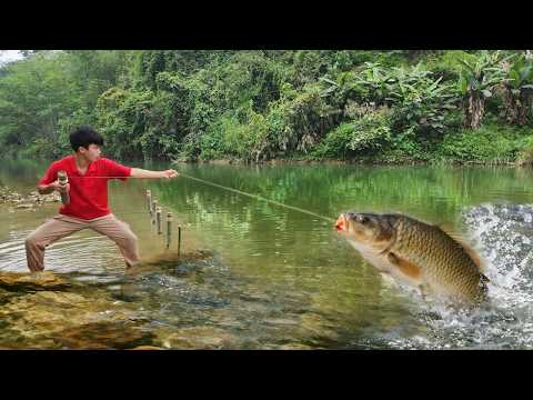 The boy used bamboo tubes and worms as bait to fish