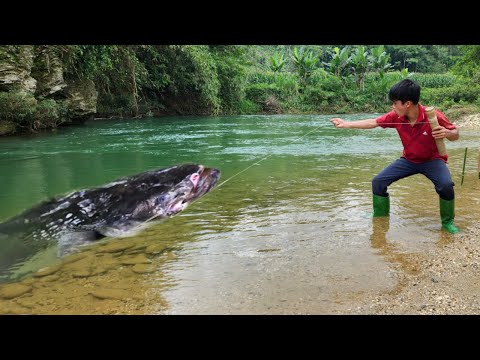 Ancient fishing technique using bamboo tubes and worm bait