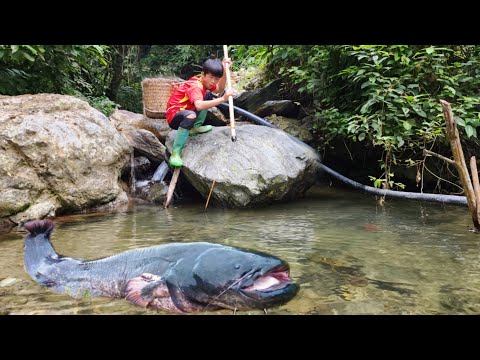 With rudimentary fishing skills boy Lam caught a big fish
