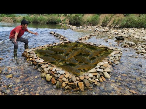 The boy cleverly stacked stones on top of each other to