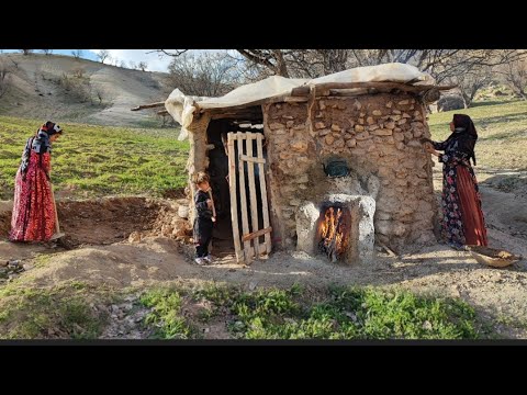 Building a hut in the mountains by a village woman