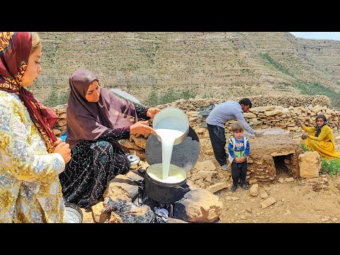 Building and cooking a traditional food in the mountains
