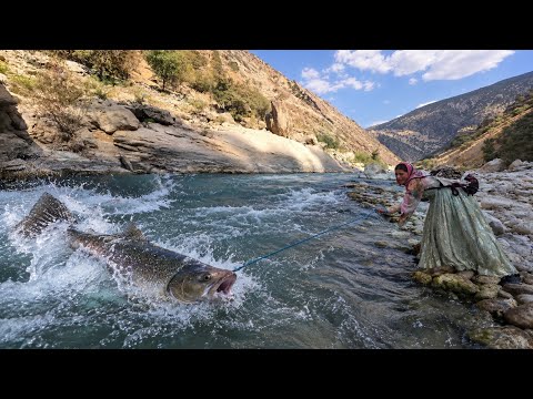 Young Nomadic Girl Fishing in the Wildest River