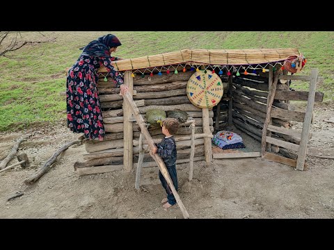 Building a hut in the mountain by a village woman and her