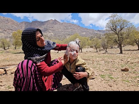 Bathing of a nomadic boy life in difficult conditions