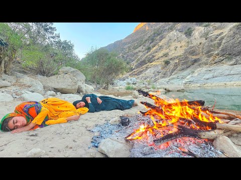 Brave Nomad Woman Fishing in Nature for Her 7 Children