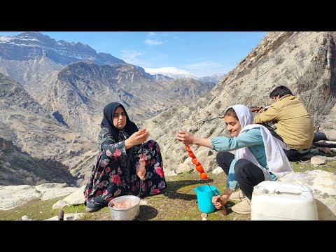A village family is grazing sheep s in the inaccessible