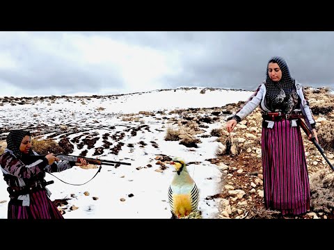 Hunting in the wild mountain by a nomadic woman