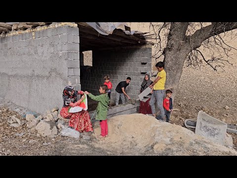 Construction of the wall of the hut by a nomadic family