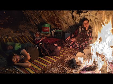 young village woman introduces her children to the place