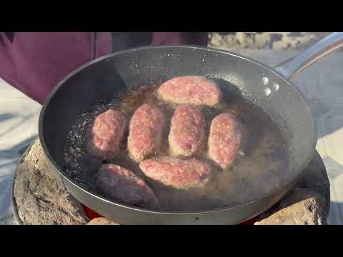 Grandma Preparing of Cauldron Cutlet With Fresh Vegetables