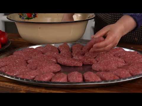 Kazan Cutlets With Vegetables Cooking on a Wood Fire
