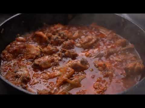Cooking Village Style Chicken Paella with Fresh Garlic