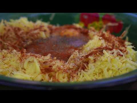 Cooking Whole Sturgeon Fish on Charcoal in the Forest