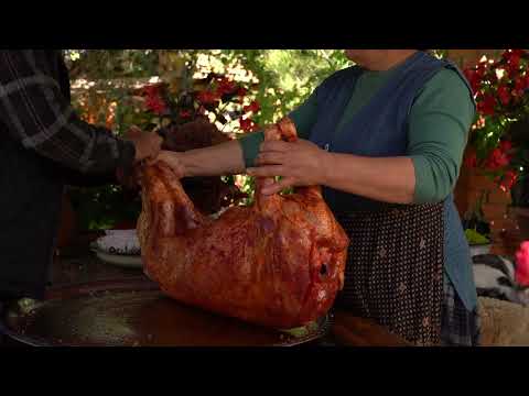 Old Style Cooking Lamb in Underground Tandoor
