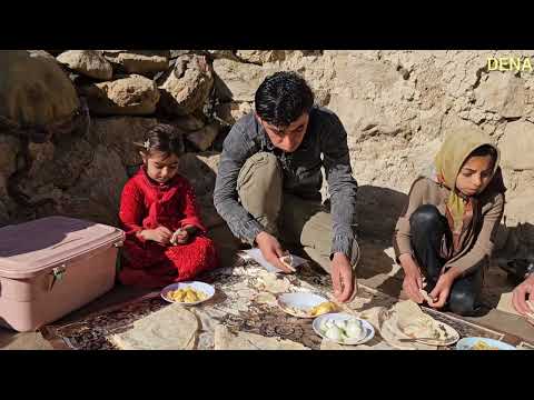 Nomads of Iran washing blankets by the river by a nomadic