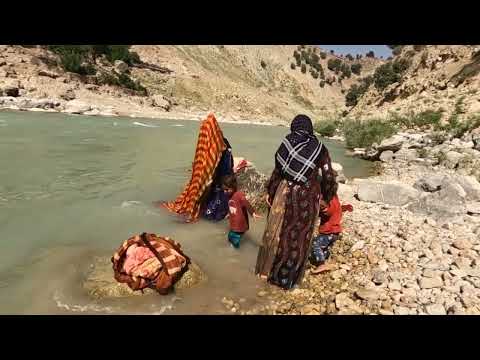 Nomads of Iran Washing clothes by the river