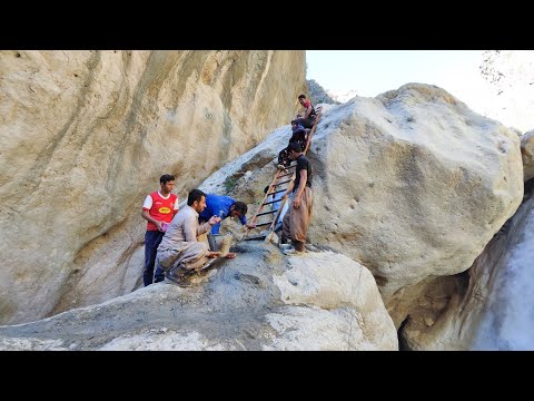 Installing a ladder on the path of Iranian nomads