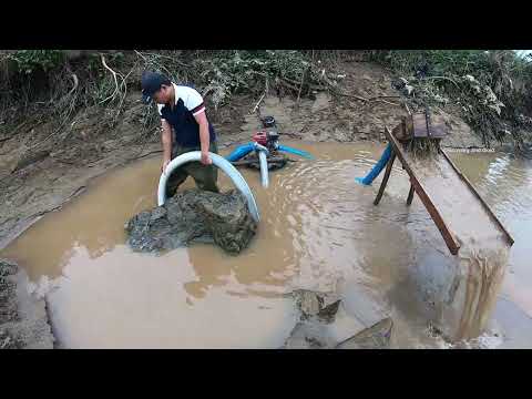 Gold Discovery Under a Massive River Rock gold