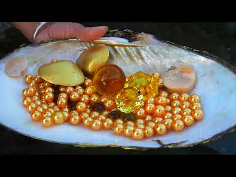 Watch this girl find glowing pearls hidden inside giant