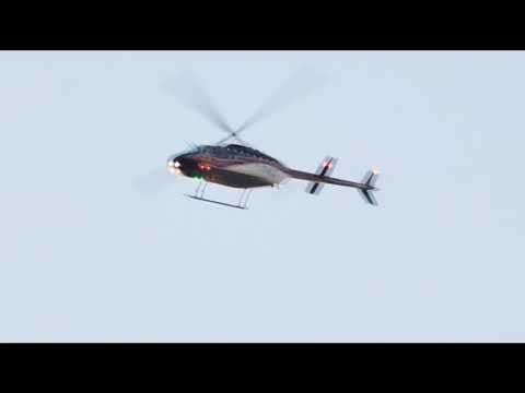 Bell 206l 4 long ranger flying over Great Sound