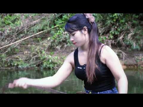 Big fish fishing with net on bamboo raft Simple net catches
