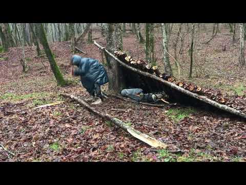 caught in a heavy rainforest no tarp survival shelter