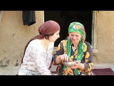 Village women cook a delicious meal with fish caught from