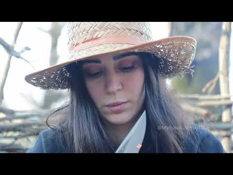 Cooking in a forest hut with fresh fish and vegetables