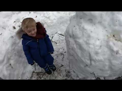 Winter Camping in Bushcraft Shelter with Animal Hides for a