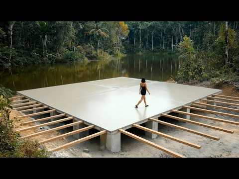 Talented Woman Builds Modern Lake House with Bridge From