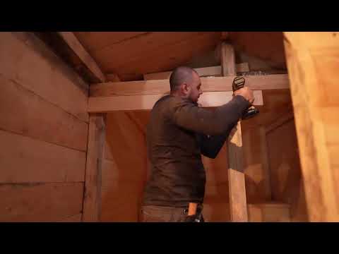 I am building a cozy wooden house in the mountains away