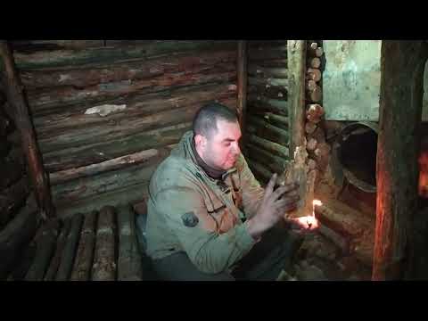 A wood burning stove from a bucket for a dugout in a wild