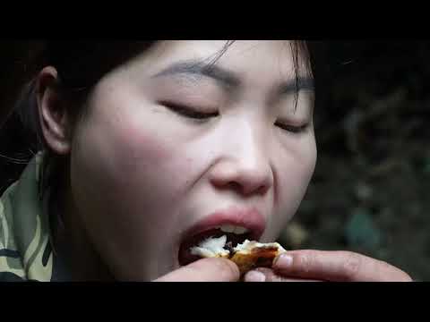 Weaving baskets to catch stream fish a way to survive in