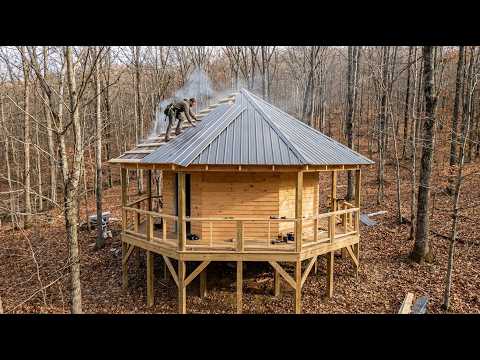 One Man Built a Warm Wooden Cabin in the Forest
