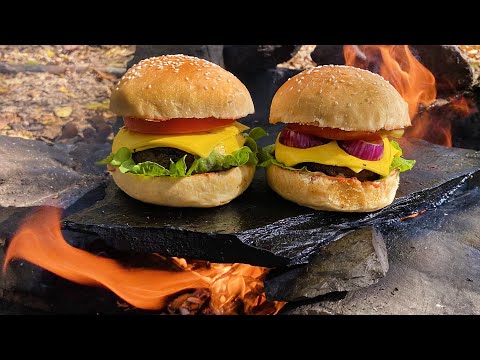 DELICIOUS BURGER COOKED IN THE WILD ON ROCKS
