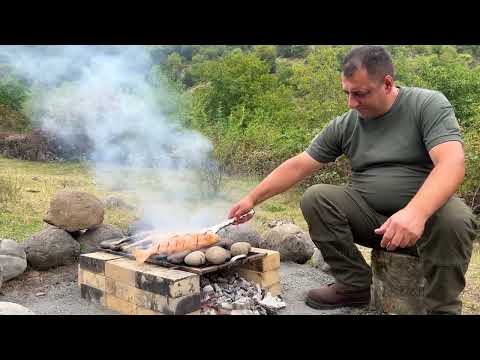 Fresh Trout Catch Straight from the River Cooked on a fire