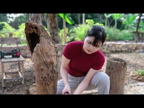 A young woman transforms a piece of rotted tree root into a