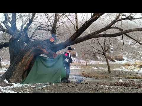 Camping in the Snow and Catching Fish by Hand Finding